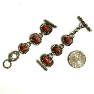 Signed - Nelson & Charlotte Eustace, Zuni. Sterling Slvr Red Coral Toggle Watch